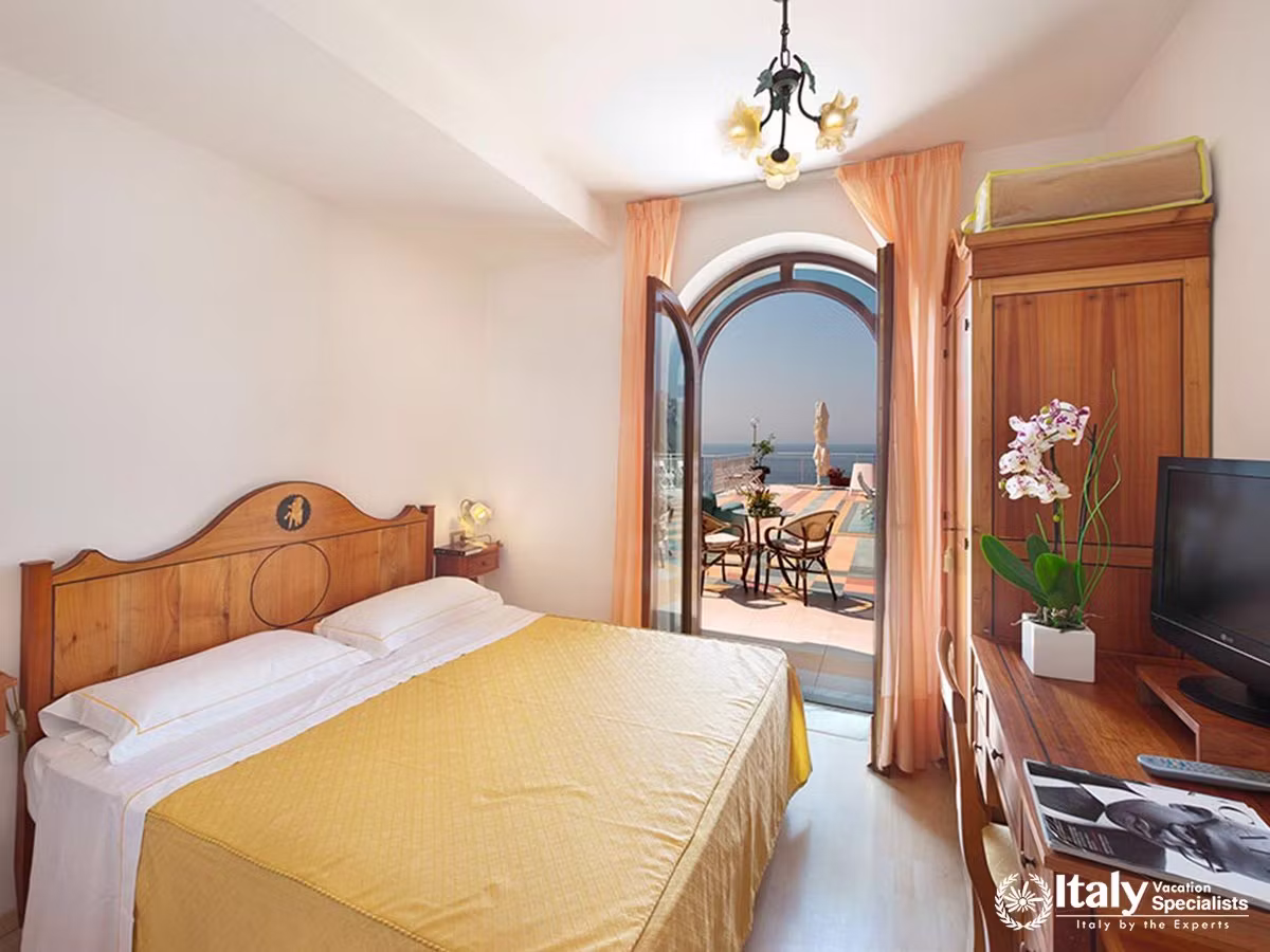A Charming Bedroom Opening onto the Sea-View Terrace