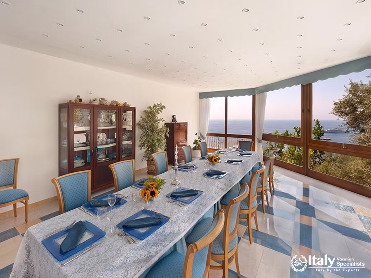 Elegant Indoor Dining with Spectacular Mediterranean Views