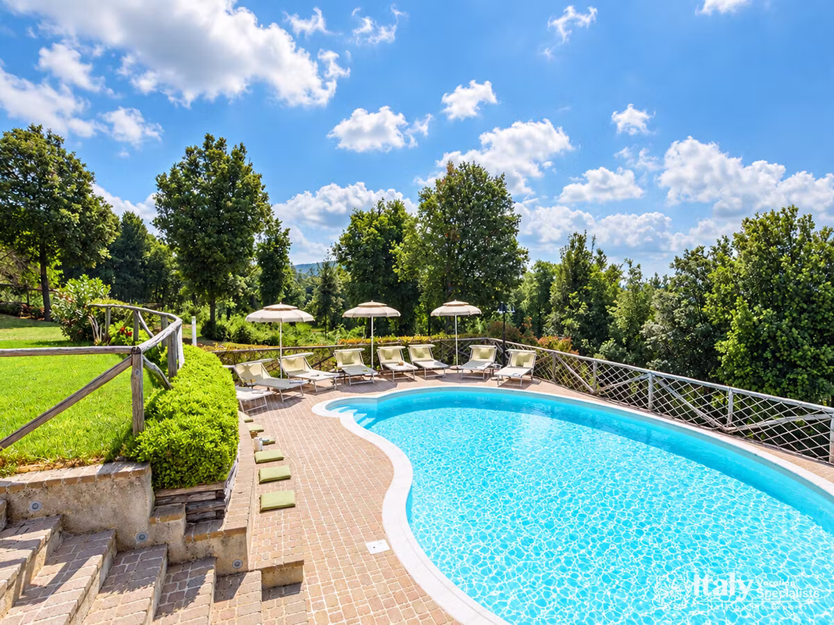 Outdoor Swimming Pool Surrounded by Greenery