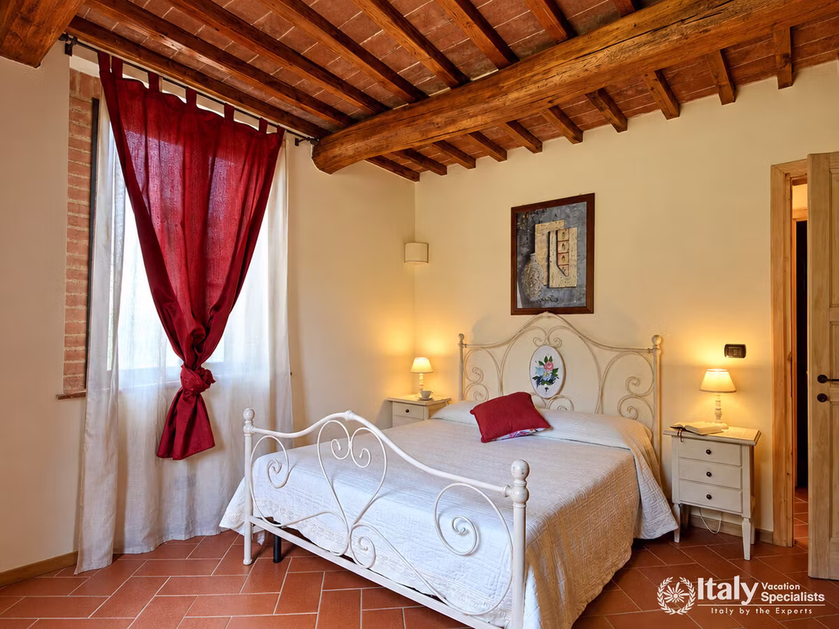 Elegant Double Bedroom with Ornate Iron Bed