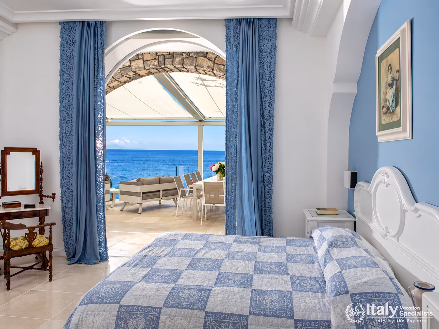 Classic Blue-and-White Bedroom with Terrace Access
