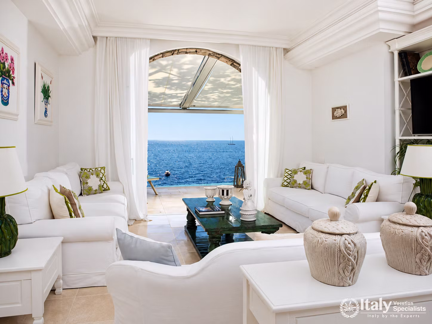 Bright Coastal Living Room Opening onto the Sea