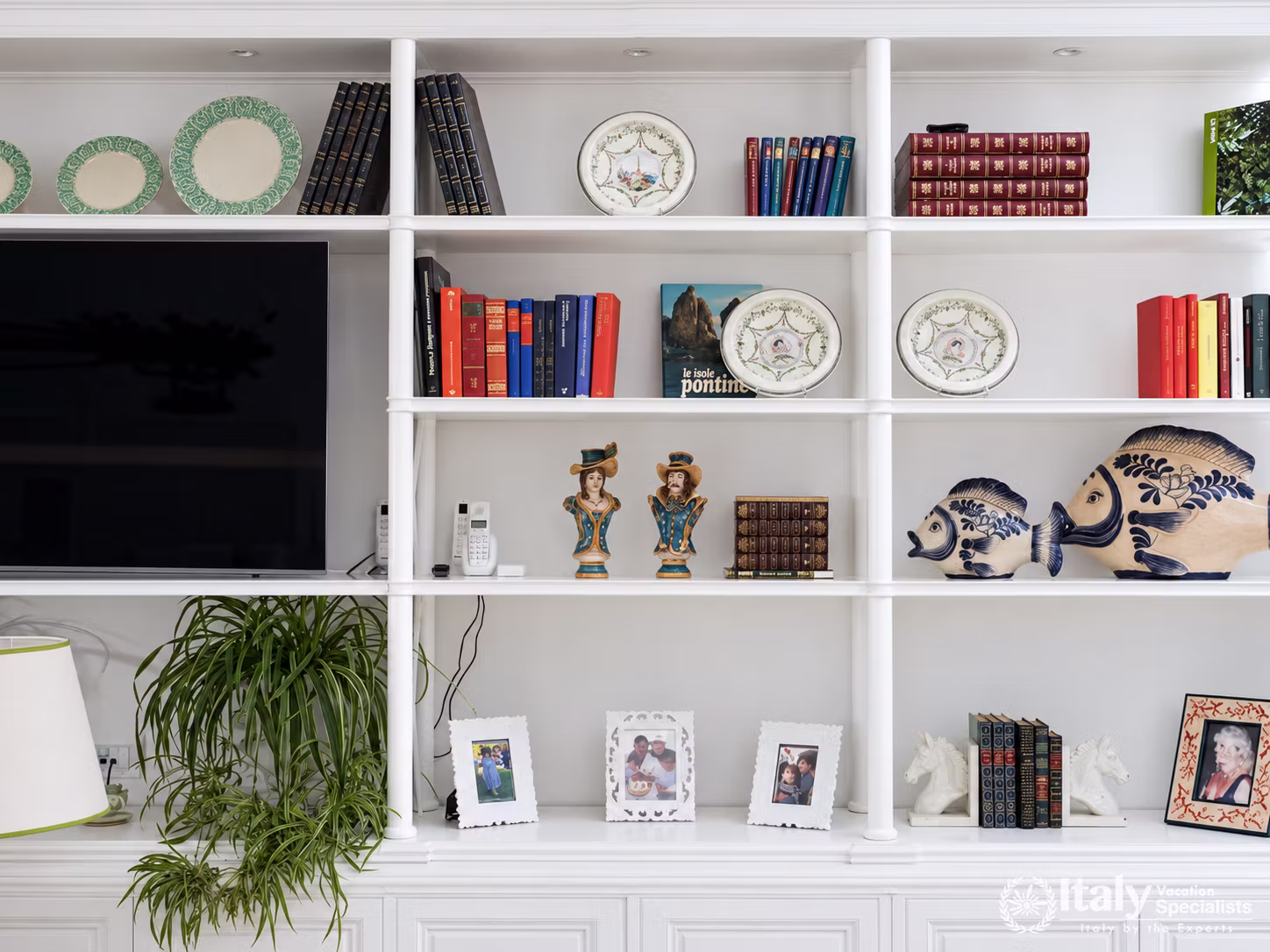 Decorative Shelving with Books and Coastal Ceramics