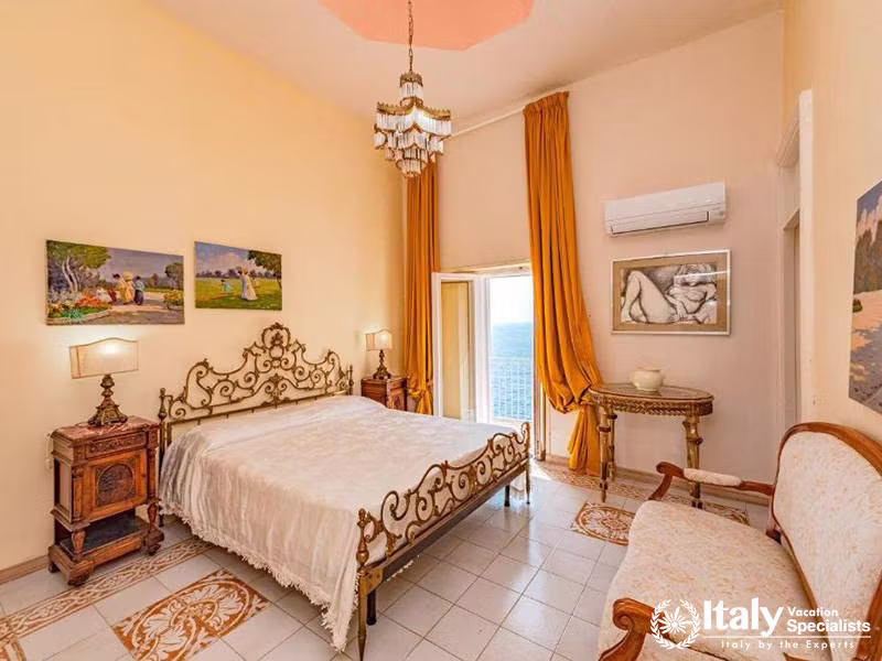 Bright Bedroom with Ocean View in Villa Bellissima Vista Mare in Campania, Italy