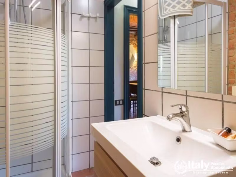 Sleek and functional bathroom with a modern shower and minimalistic design.