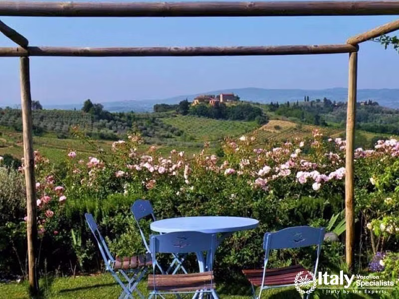 Garden seating with a view of the Tuscan hills near Florence, Italy.