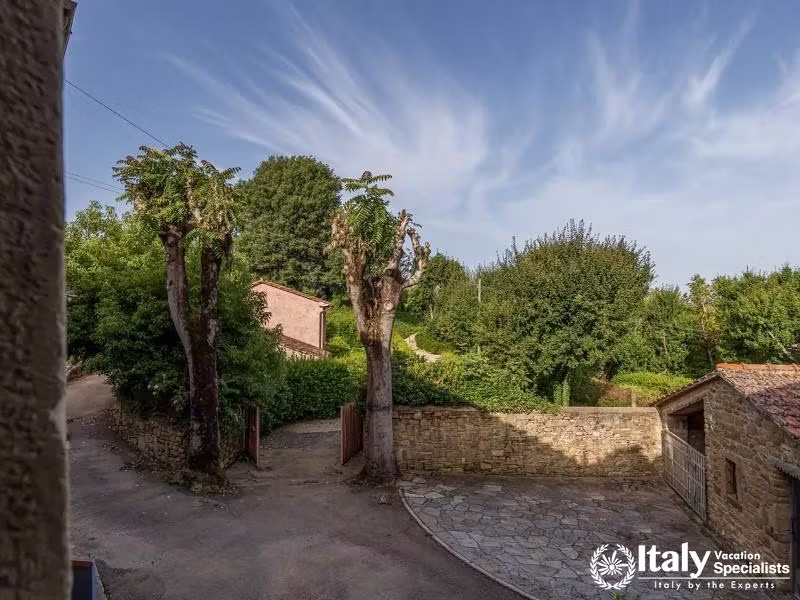 Quaint Exterior: Admire the picturesque surroundings of the villa.
