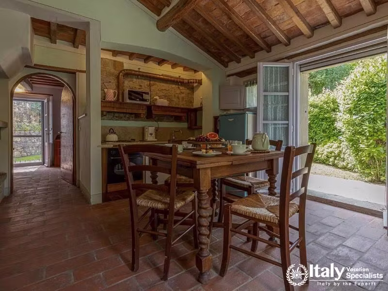 Open Dining Area: Cozy dining space with garden access.
