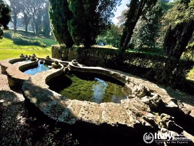 Tranquil garden with a unique stone water feature.
