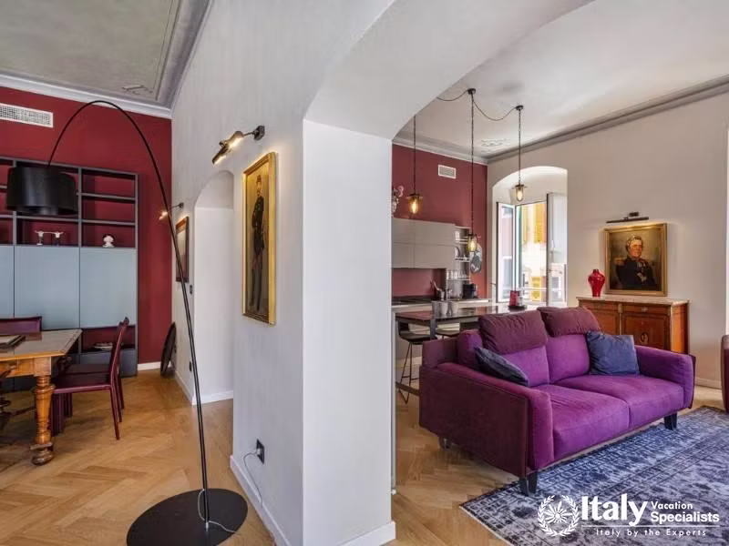 Cozy seating and dining areas with rich accents and classic artwork.