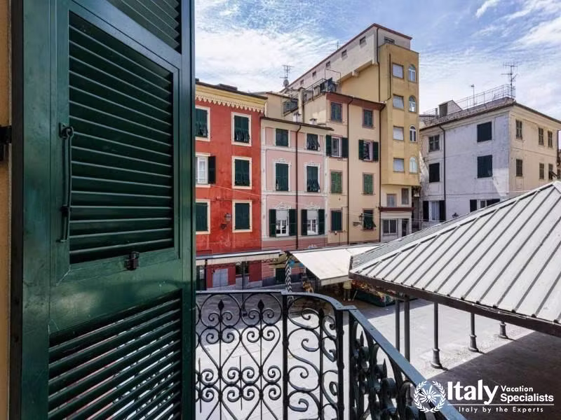 Charming view of colorful, historic buildings from the private balcony.
