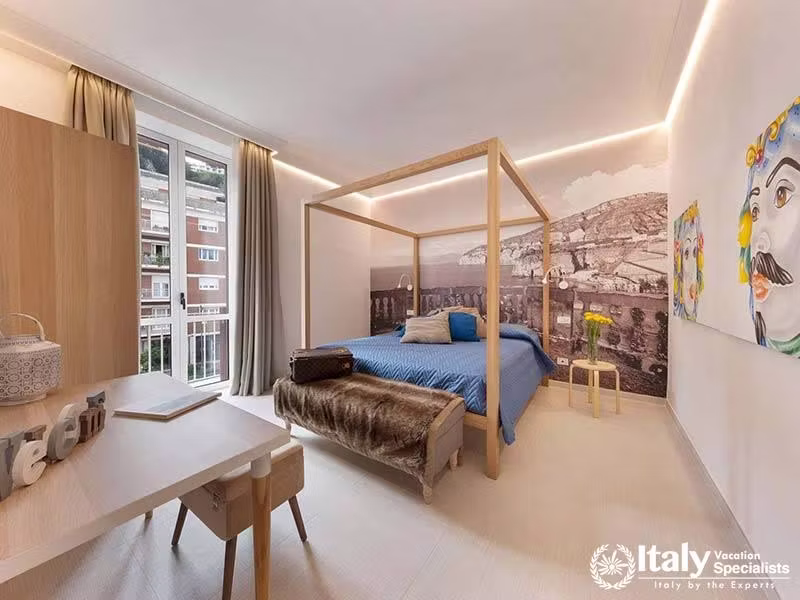 Stylish Four-Poster Bedroom at Tasso Luxe Stay in Sorrento, Italy
