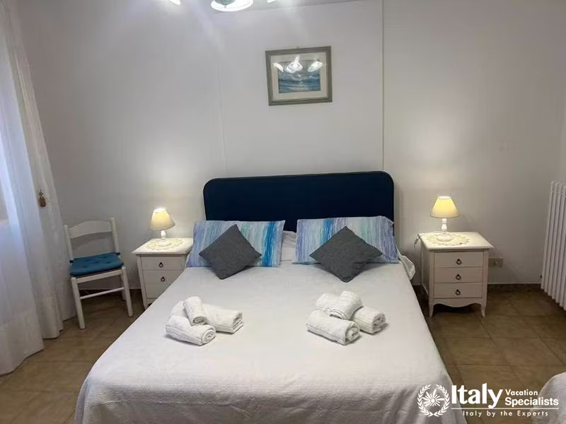 Inviting Bedroom with Fresh Linens at Villa Alimini in Otranto, Italy