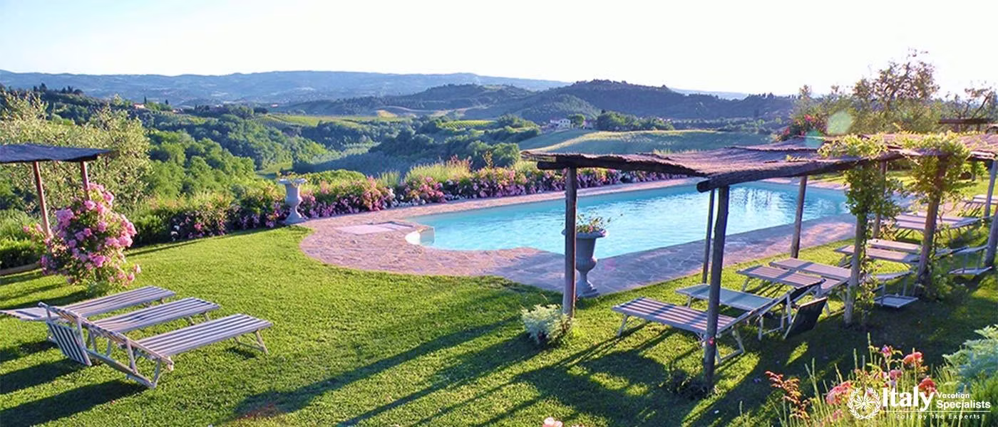 Scenic swimming pool with panoramic views near Florence, Italy.