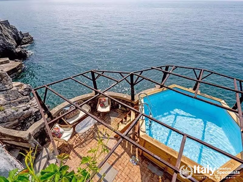 Pool terrace with a peaceful seaside retreat.