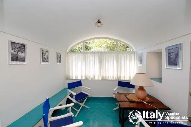 Blue chairs for sitting in Villa Tomeu