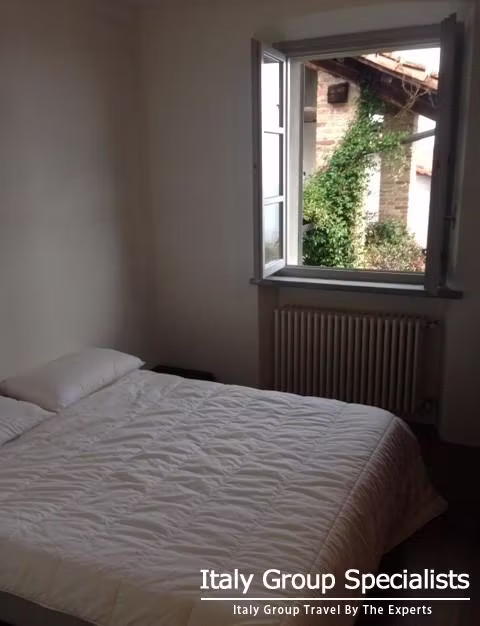 Bedroom on the first floor with balcony