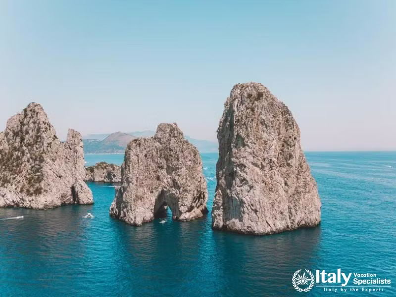 The majestic Faraglioni rock formations off the coast of Capri.