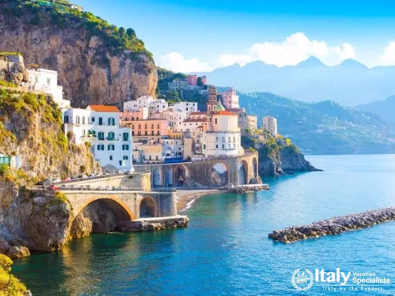 cenic view of the Amalfi Coast with its stunning cliffs and seaside buildings.