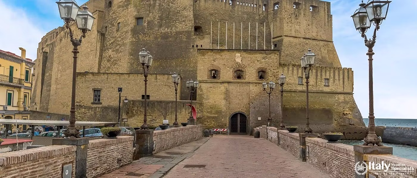 A view down the causeway leading Ovo Castle in Naples, Italy