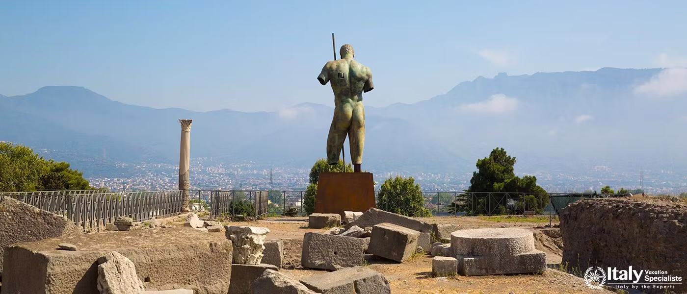 Man statue on square of ancient city of Pompei, Naples, Italy.