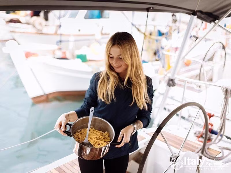 Woman cook italian pasta 