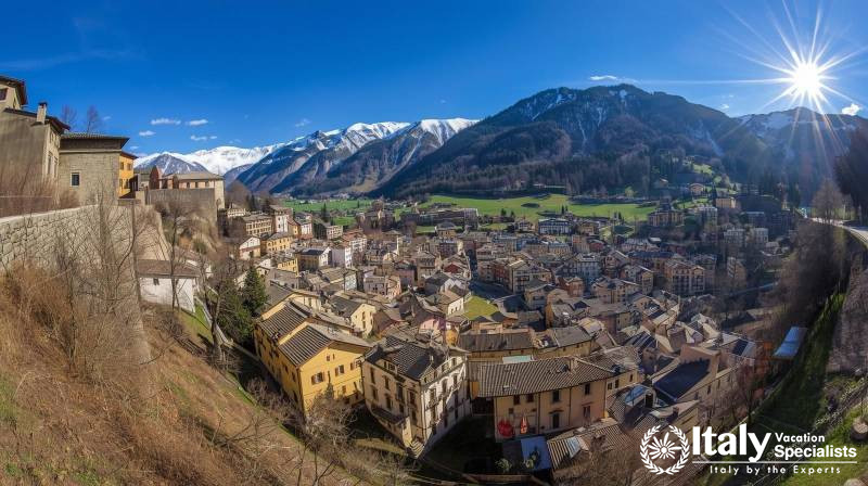 Bormio nestled in the Valtellina Valley and surrounded by the majestic peaks of the Italian Alps