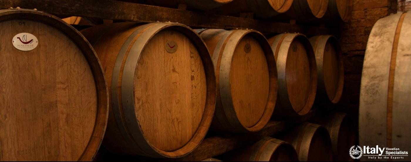Stored wine barrels in Tenuta Sette Ponti