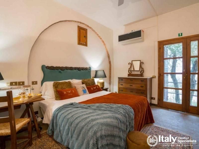 Intimate Elegance in Relais La Chiusas Cozy Standard Room
