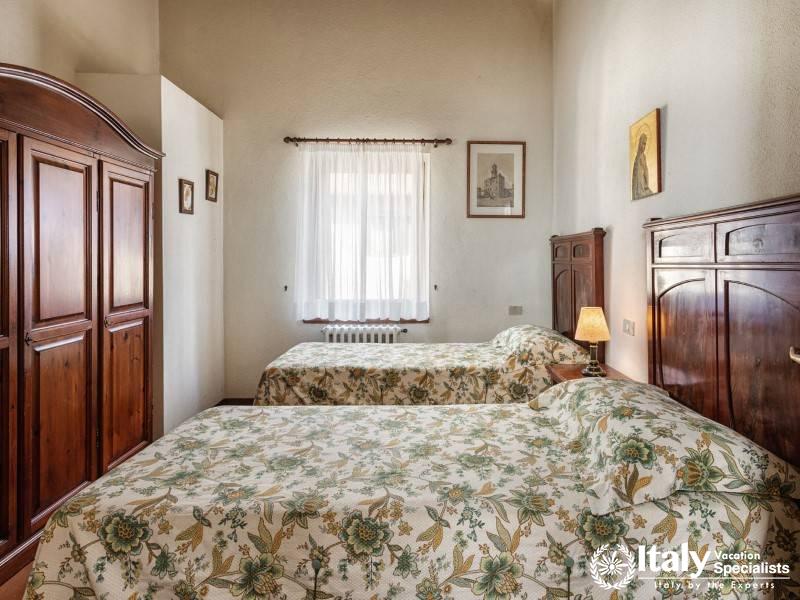 Rest peacefully in our charming twin bedroom, offering a blend of rustic charm and modern comfort.