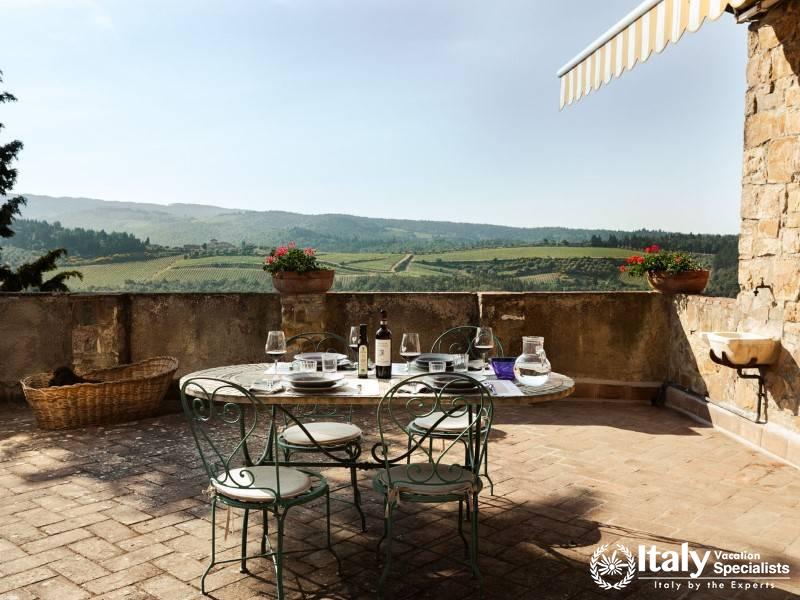 Savor stunning views of the Tuscan countryside from our picturesque terrace dining area.