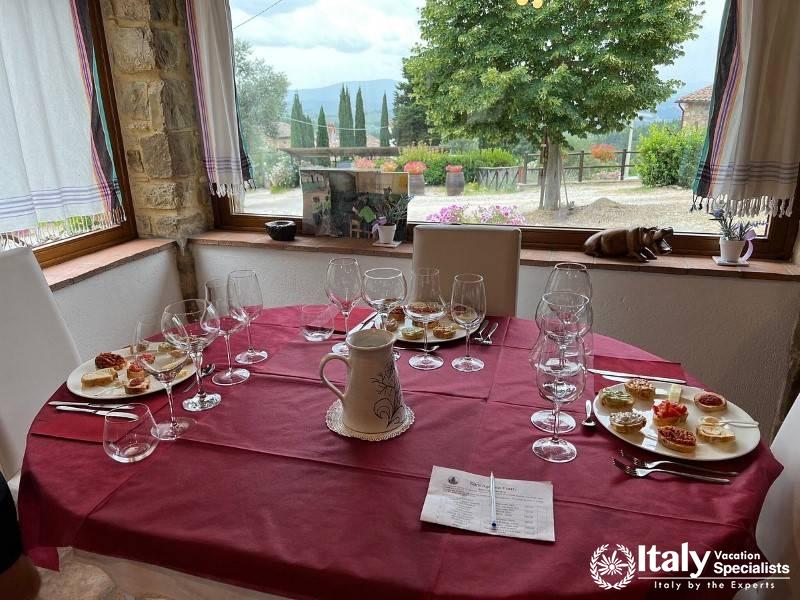 A beautifully set table ready for a wine tasting session at SantAgnese Farm.