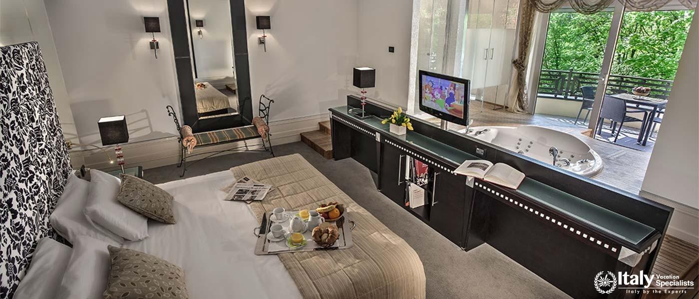 Relax in luxury with our spacious rooms, complete with modern amenities and a private Jacuzzi.