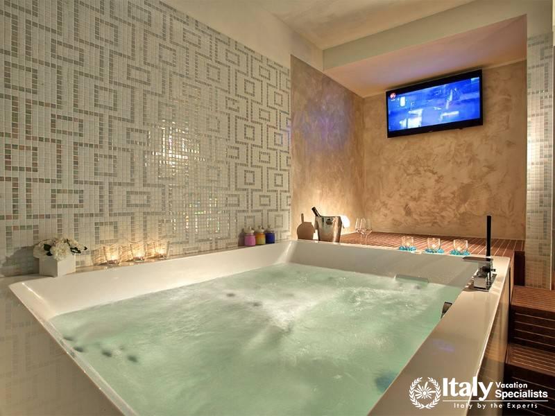 Unwind in a private Jacuzzi, perfect for a soothing, luxurious experience.