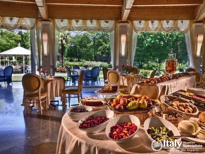 Start your day with a vibrant breakfast spread, surrounded by natureâ€™s beauty.