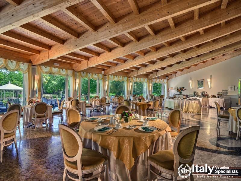 Enjoy a delightful dining experience in our elegant restaurant, with views of the garden.