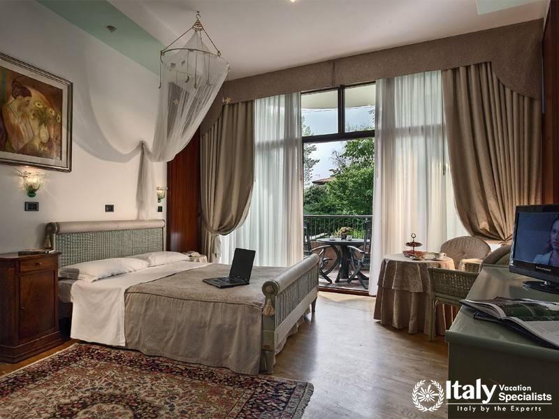 Relax in a luxurious room that combines classic elegance with modern comforts