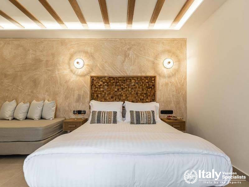 Elegant bedroom design with modern touches at Perla Hotel in Naxos, Greece Elegant bedroom design with modern touches at Perla Hotel in Naxos, Greece