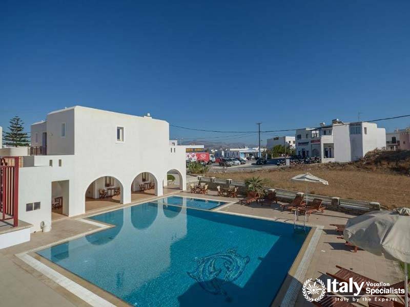 Spacious pool area at Perla Hotel in Naxos, Greece Spacious pool area at Perla Hotel in Naxos, Greece