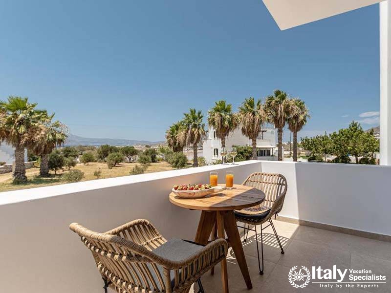 Relaxing outdoor seating with a view at Perla Hotel in Naxos, Greece Relaxing outdoor seating with a view at Perla Hotel in Naxos, Greece