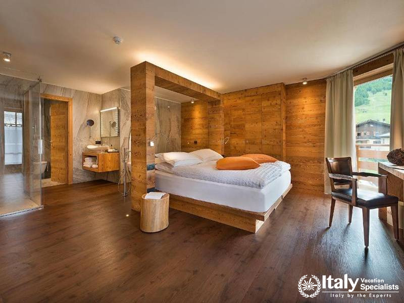 Cozy and Comfortable Bedroom with Scenic Views in Bivio Hotel Plaza in Livigno, Italy