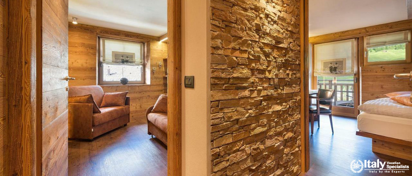 Cozy Room with Wooden Interiors in Bivio Hotel Plaza in Livigno, Italy