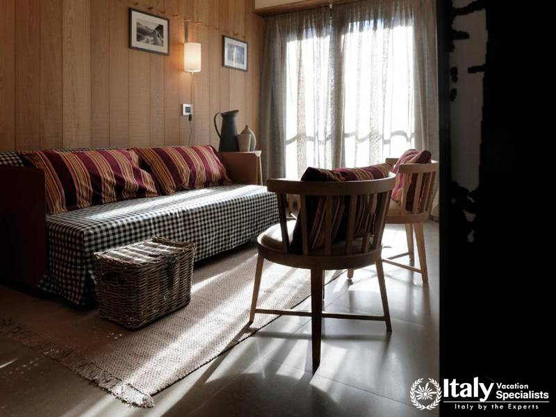 Relaxing Lounge with Wooden Accents in Eden Hotel