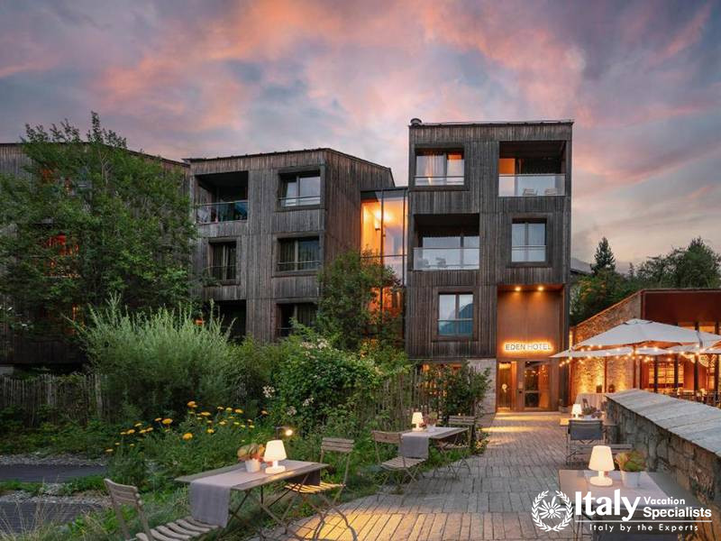 Eden Hotel Exterior with Garden and Evening Lights