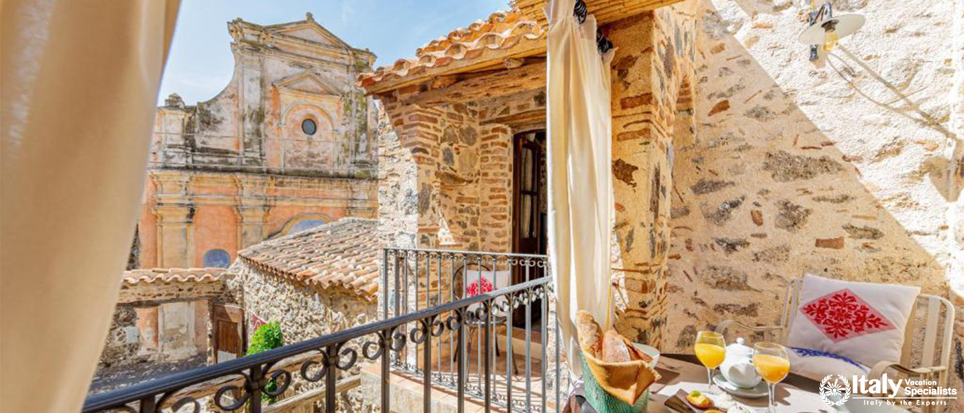 Sunny Outdoor Courtyard at Albergo Diffuso Mannois, Orosei, Sardinia