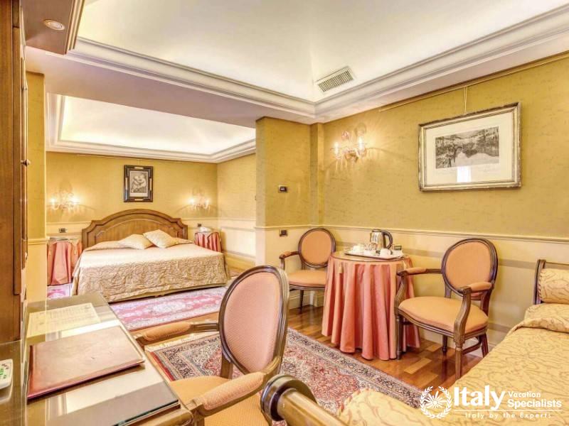 Spacious and refined, the deluxe suite at Hotel Al Codega offers a touch of Venetian luxury.