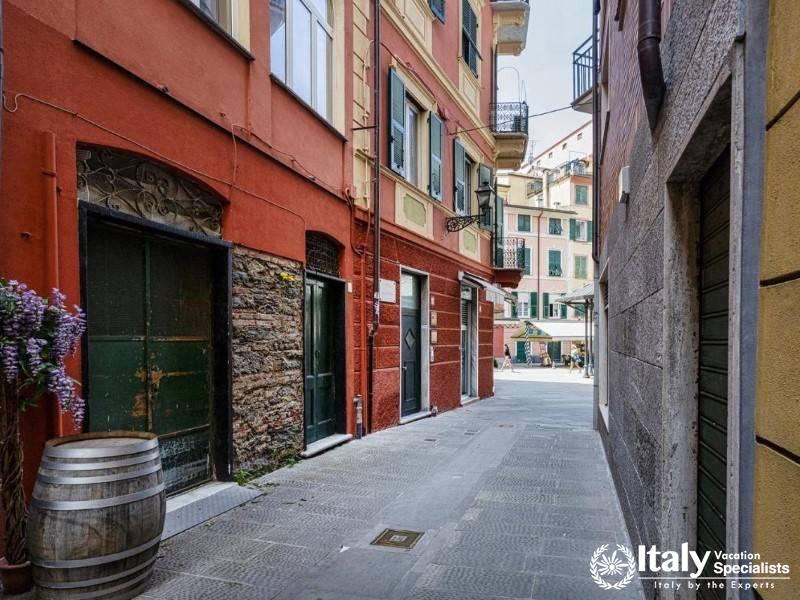 Picturesque street lined with traditional Italian facades.