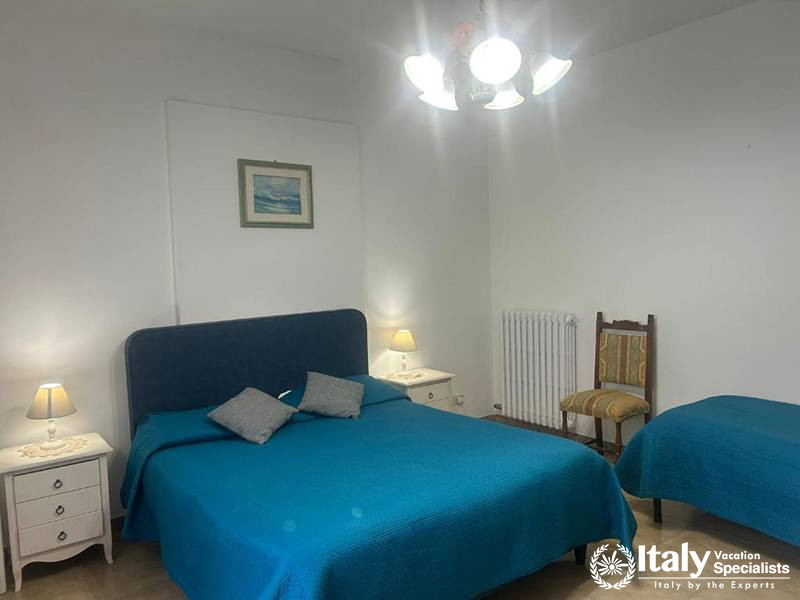 Comfortable Bedroom with Blue Bedding at Villa Alimini in Otranto, Italy
