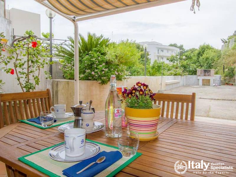 Outdoor Dining Space with Scenic Views at Villa Alimini in Otranto, Italy