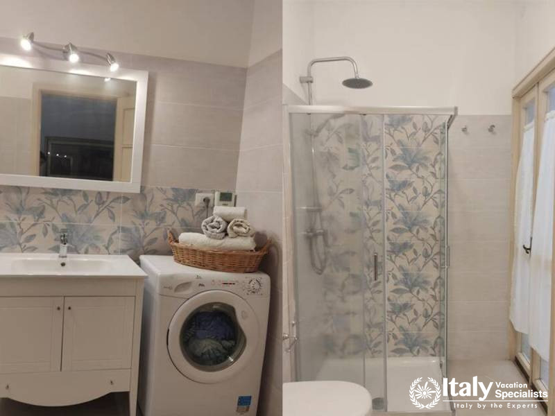 Modern Bathroom with Washer and Shower at Villa Alimini in Otranto, Italy